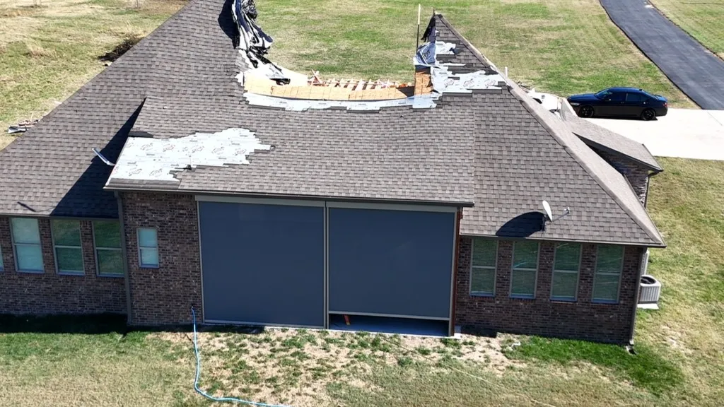 Drone footage motorized retractable screens survive 115 mph winds with no blowouts